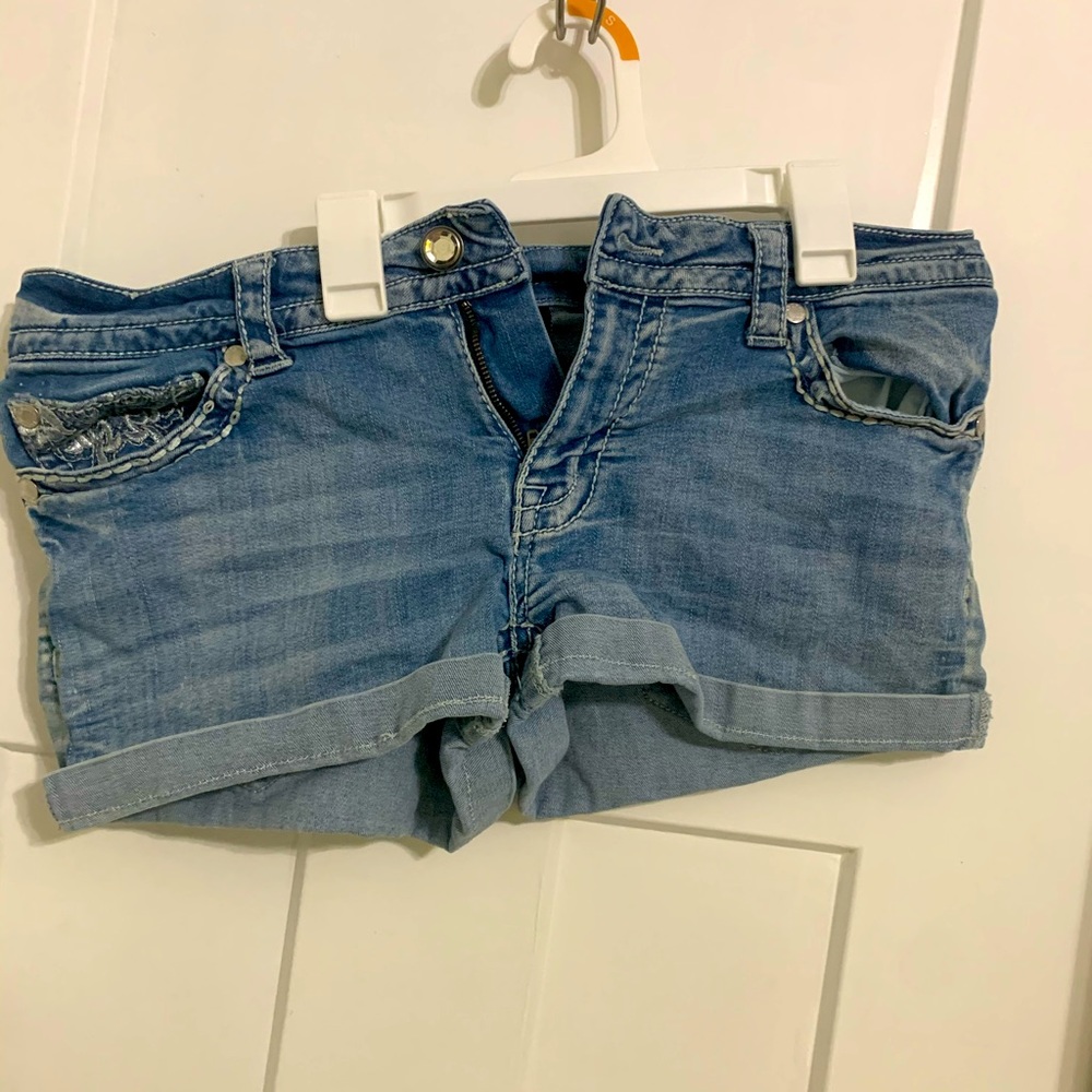 Low rise jean shorts with cute design on the butt